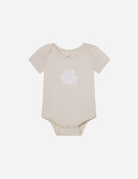Our World Needs Jesus Beige Onesie Christian Baby Clothing